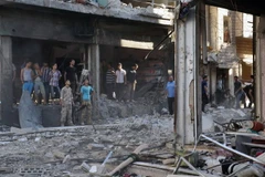 [Photo] 14 người bị thương trong vụ đánh bom xe tại Syria