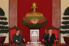 Tổng Bí thư tiếp đoàn đại biểu cấp cao Chính phủ Lào 