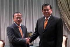 Thứ trưởng Ngoại giao Việt Nam Vũ Hồng Nam (trái) trong buổi chào xã giao Phó Thủ tướng, Bộ trưởng Ngoại giao Thái Lan Tanasak Patimapragon. (Ảnh: Hà Linh/Vietnam+