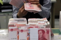 Đồng nhân dân tệ. (Ảnh: AFP/TTXVN)