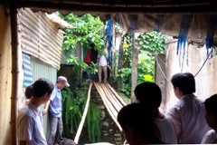 Hiện trường nơi nạn nhân bị lũ cuốn trôi. (Ảnh: Đức Tưởng/TTXVN)