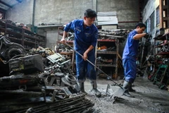 Một tuần nữa, khoảng 4.000 công nhân ở mỏ Mông Dương sẽ được nghỉ việc, có nguy cơ bị chuyển sang chỗ làm khác. (Ảnh: Minh Sơn/Vietnam+)