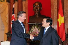 Chủ tịch nước Trương Trương Tấn Sang tiếp Thủ tướng Liên hiệp Vương quốc Anh và Bắc Ireland David Cameron. (Ảnh: Nguyễn Khang/TTXVN)