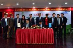 Lãnh đạo hai bên tham gia ký kết. (Nguồn: Vietcombank)