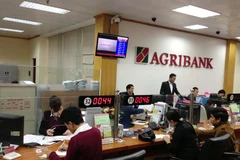 Giao dịch tại Agribank. (Nguồn: TTXVN)
