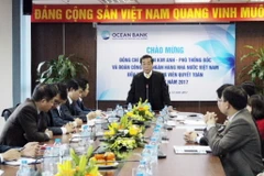 Phó Thống đốc Nguyễn Kim Anh động viên công tác quyết toán cuối năm Oceanbank. (Nguồn: NHNN)