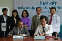 Đại diện ABBANK và VNI ký kết thỏa thuận hợp tác tại buổi lễ. (Nguồn: ABBANK)