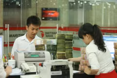 Cải thiện chỉ số tiếp cận tín dụng từ cải cách thủ tục hành chính. (Nguồn: TTXVN)