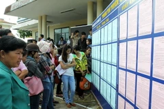 Người lao động tìm việc. (Ảnh: Hồ Cầu/TTXVN)