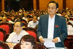 Ông Trần Du Lịch - đại biểu Quốc hội Thành phố Hồ Chí Minh phát biểu. (Ảnh: Trọng Đức/TTXVN)