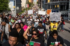 Tổng thống Mỹ Barack Obama nỗ lực giải quyết mâu thuẫn sắc tộc