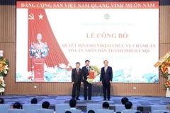 Lễ công bố quyết định bổ nhiệm chức vụ Chánh án Tòa án Nhân dân thành phố Hà Nội. (Nguồn: Đài phát thanh và truyền hình Hà Nội)