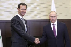 Tổng thống Nga Vladimir Putin (phải) trong cuộc gặp người đồng cấp Syria Bashar al-Assad. (Nguồn: Reuters)