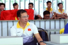 Nỗi buồn của xạ thủ Hoàng Xuân Vinh sau khi bị loại. (Ảnh: Quốc Khánh/TTXVN)