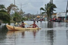 Ngập lụt do bão Maria tại Juana Matos thuộc Catano, Puerto Rico ngày 21/9. (Nguồn: AFP/TTXVN)