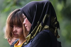 Nghi phạm Đoàn Thị Hương xuất hiện tại tòa án Malaysia. (Nguồn: AFP)