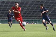 Cầu thủ U22 Việt Nam triển khai bóng tấn công. (Ảnh: Tuấn Cương/TTXVN)