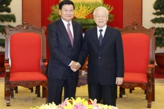 Tổng Bí thư, Chủ tịch nước Nguyễn Phú Trọng tiếp Thủ tướng Lào Thongloun Sisoulith. (Ảnh: Trí Dũng/ TTXVN)