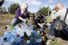 Xung đột tại Đông Ukraine đang khiến nhiều người không có nước sạch. (Nguồn: Daily Times)