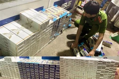 Số thuốc lá ngoại nhập lậu bị lực lượng Công an phát hiện và thu giữ. (Ảnh: TTXVN phát)