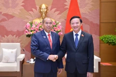 Phó Chủ tịch Quốc hội Nguyễn Khắc Định và Chủ nhiệm Uỷ ban các Dân tộc Quốc hội Lào Khamchanh Sotapaserth. (Nguồn: Cổng Thông tin điện tử Quốc hội)
