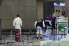 Cảnh sát điều tra tại hiện trường vụ tấn công. (Nguồn: EPA/TTXVN)