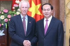Chủ tịch nước Trần Đại Quang tiếp Ngài Stephane Dion, Bộ trưởng Ngoại giao Canada. (Ảnh: Nhan Sáng/TTXVN)