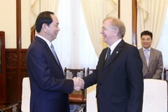 Chủ tịch nước Trần Đại Quang tiếp Ngài David Devine, Đại sứ Đặc mệnh toàn quyền Canada tại Việt Nam đến chào từ biệt kết thúc nhiệm kỳ công tác tại Việt Nam. (Ảnh: Nhan Sáng/TTXVN)