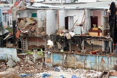 Hiện trường vụ nổ kinh hoàng, sáng 18/10/2014. (Ảnh: Mạnh Linh/TTXVN)