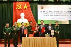Lãnh đạo hai bên tham gia ký kết. (Nguồn: Vietcombank)