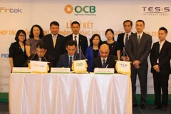 Lãnh đạo các bên tham gia ký kết. (Nguồn: OCB)