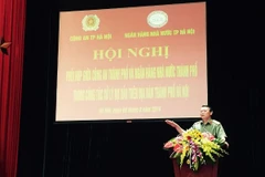 Ông Nguyễn Hùng Lĩnh, Cục trưởng Cục an ninh tiền tệ phát biểu tại hội nghị. (Ảnh: PV/Vietnam+)