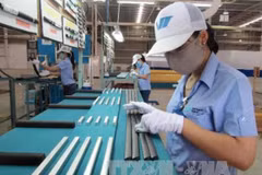 Lắp ráp tại một doanh nghiệp FDI. (Nguồn: TTXVN)