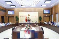 UBTV Quốc hội biểu quyết thông qua dự thảo Nghị quyết về chức năng, nhiệm vụ, quyền hạn và cơ cấu tổ chức của Ban Công tác đại biểu. (Ảnh: Doãn Tấn/TTXVN)