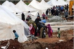 Bạo loạn ở Syria đã khiến nhiều người dân vượt biên sang tỵ nạn tại Thổ Nhĩ Kỳ (Nguồn: AP)