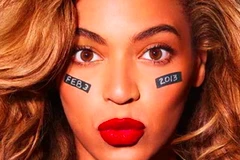 Gương mặt Beyonce với hai bên má ghi ngày tổ chức trận đấu. (Nguồn: beyonce.com)