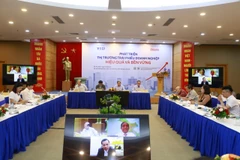 Diễn đàn “Phát triển Thị trường trái phiếu doanh nghiệp hiệu quả và bền vững,” ngày 19/5, (Ảnh: Vietnam+)