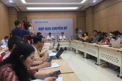 Họp báo chuyên đề về "Kết quả bước đầu và những vấn đề cần giải quyết khi triển khai hóa đơn điện tử trên phạm vi toàn quốc," ngày 1/6. (Ảnh: Vietnam+)