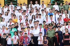 Chủ tịch nước Tô Lâm với các đại biểu. (Ảnh: Nhan Sáng/TTXVN)