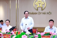 Thủ tướng Phạm Minh Chính phát biểu tại buổi làm việc với Ban Thường vụ Thành ủy Hà Nội. (Ảnh: Dương Giang/TTXVN)