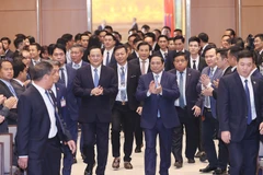 Thủ tướng Việt Nam và Lào dự Hội nghị hợp tác đầu tư giữa hai nước