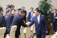 Thủ tướng Phạm Minh Chính tiếp Đoàn đại biểu Ủy ban Kinh tế Nhật-Việt. (Ảnh: Dương Giang/TTXVN)