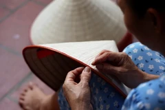 May cạp nón. (Ảnh: Hồng Đạt/TTXVN)