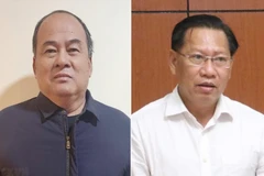 Bãi nhiệm chức vụ đối với ông Nguyễn Thanh Bình và ông Trần Anh Thư. (Ảnh: TTXVN)