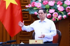 Thủ tướng Phạm Minh Chính chủ trì họp về tình hình thi công Dự án đường dây 500kV mạch 3. (Ảnh: Dương Giang/TTXVN)