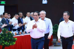 Thủ tướng Phạm Minh Chính đến dự Hội nghị triển khai Nghị quyết số 136 của Quốc hội về phát triển thành phố Đà Nẵng. (Ảnh: Dương Giang/TTXVN)