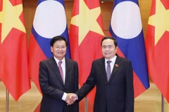 Chủ tịch Quốc hội Trần Thanh Mẫn hội kiến Tổng Bí thư, Chủ tịch nước Lào Thongloun Sisoulith. (Ảnh: Thống Nhất/TTXVN)