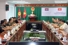 Quang cảnh buổi thăm và chúc Tết. (Ảnh: Phạm Minh Tuấn/TTXVN)