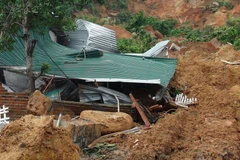 Hiện trường vụ sạt lở đất. (Ảnh: Nguyên Lý/TTXVN)