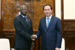 Chủ tịch nước Trần Đại Quang tiếp ông Ousmane Dione, Giám đốc Quốc gia Ngân hàng Thế giới (WB) tại Việt Nam. (Ảnh: Nhan Sáng/TTXVN) 